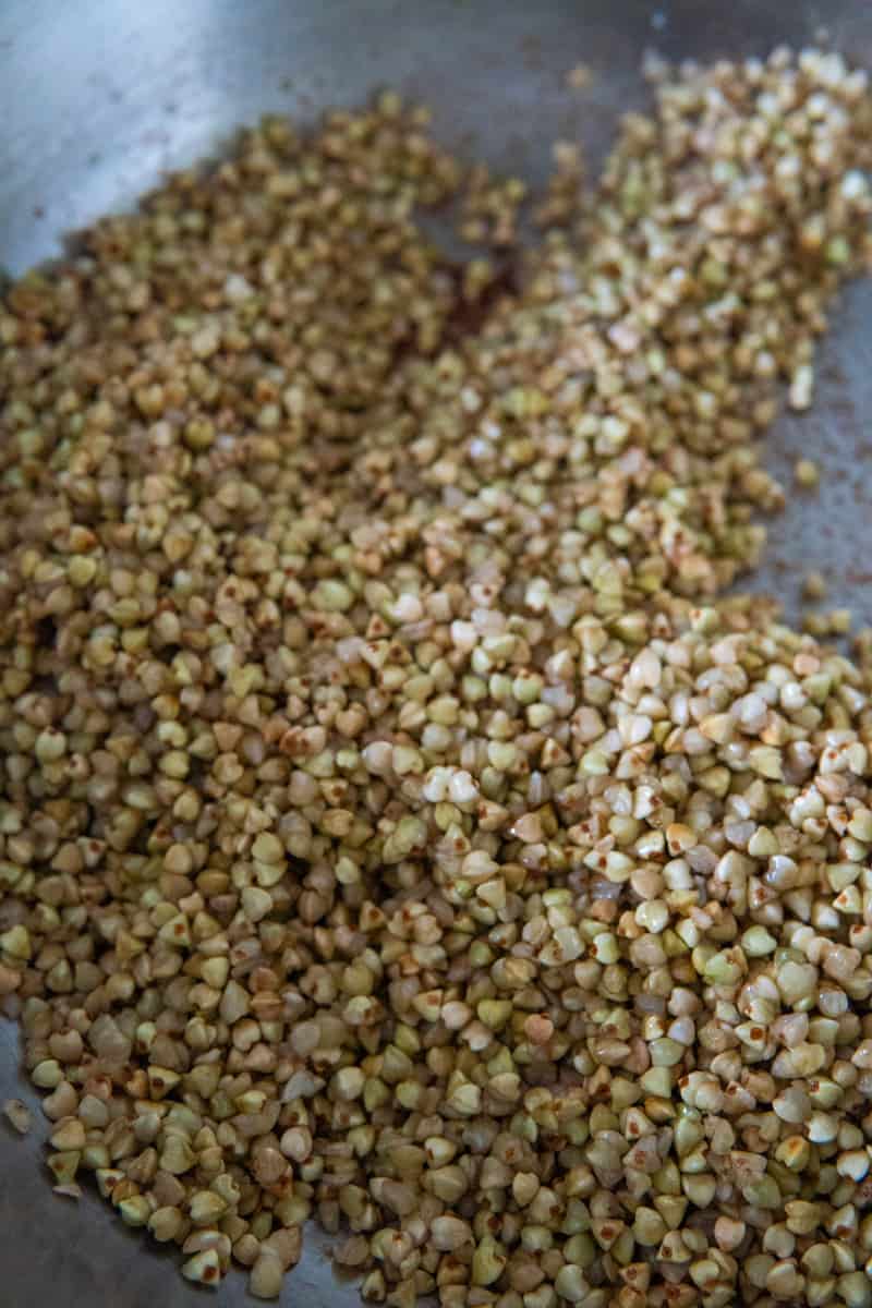 Toasted buckwheat groats, or kasha, in a pan.