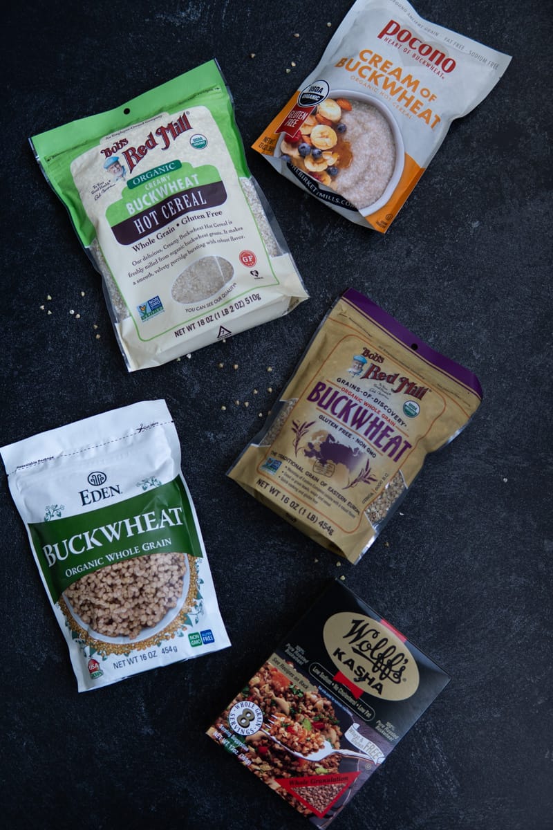 Five different brand packages of buckwheat.